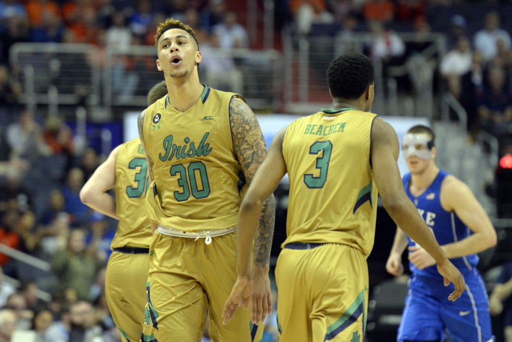 Mar 10, 2016; Washington, DC, USA; Notre Dame Fighting Irish forward Zach Auguste (30) celebrates after scoring in the second half against the Duke Blue Devils during day three of the ACC conference tournament at Verizon Center. Notre Dame Fighting Irish defeated Duke Blue Devils 84-79 in overtime Mandatory Credit: Tommy Gilligan-USA TODAY Sports